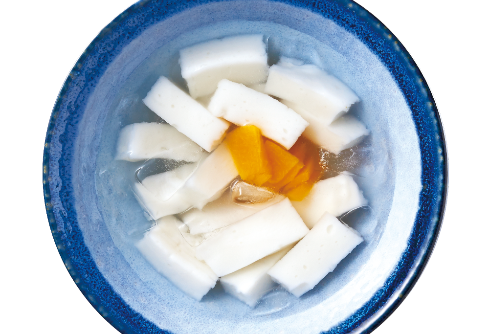 Sweetened Almond Tofu with Peach Slices in Syrup